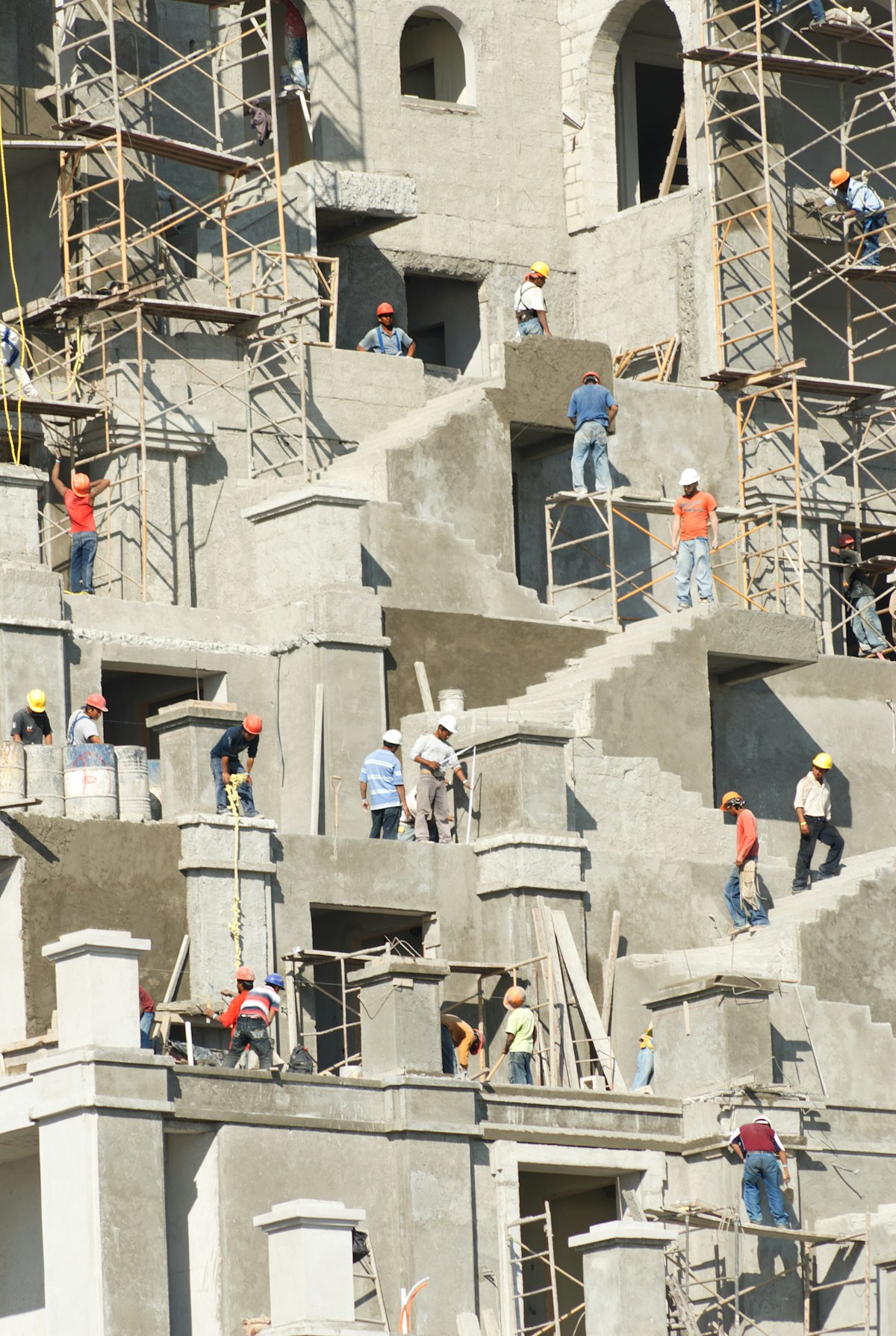 Construction site with workers and scaffolding